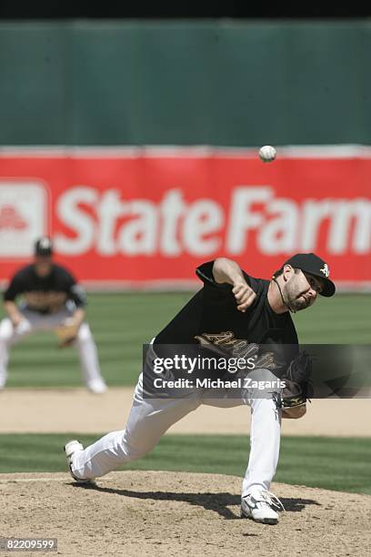 Andrew Brown of the Oakland Athletics pitches during the game against the Florida Marlins at McAfee Coliseum in Oakland, California on June 22, 2008....