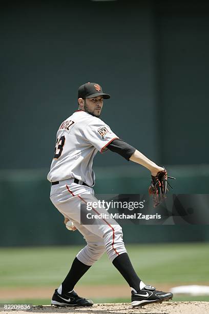 Jonathan Sanchez of the San Francisco Giants pitches during the game against the Oakland Athletics at McAfee Coliseum in Oakland, California on June...