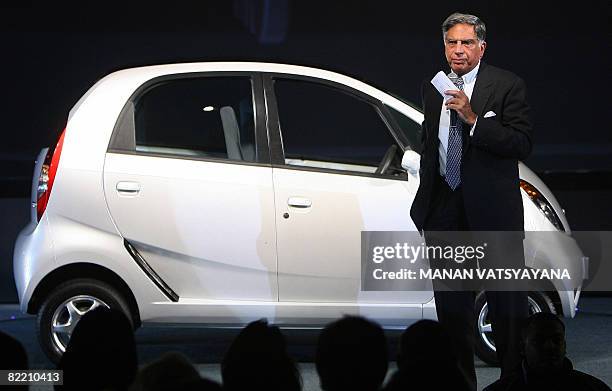 In this picture taken on January 10, 2008 chairman of the Tata Group, Ratan Tata addresses mediapersons after unveilingthe new Tata "Nano" car at the...