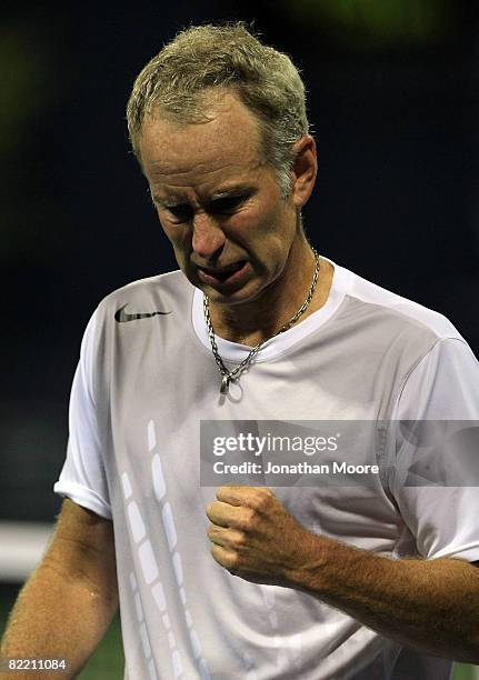 John McEnroe reacts while taking on Mikael Pernfors of Sweden during day four of the Countrywide Classic at the Los Angeles Tennis Center-UCLA on...