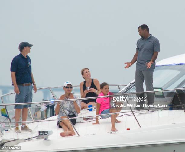 Grand Marshall, actor Alfonso Ribeiro waves to the crowd during the 2017 Night in Venice Boat Parade Saturday July 22, 2017 in Ocean City, , New...