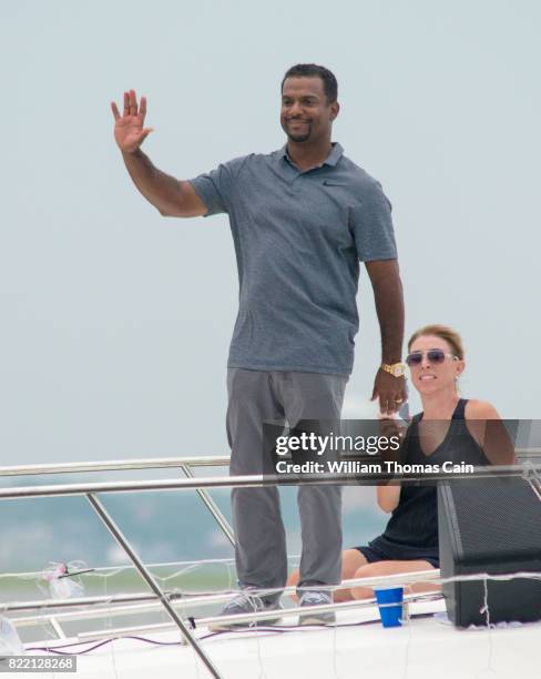 Grand Marshall, actor Alfonso Ribeiro waves to the crowd during the 2017 Night in Venice Boat Parade Saturday July 22, 2017 in Ocean City, , New...