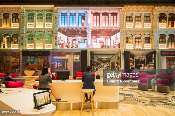 Traditional Singaporean Peranakan building facades adorn a wall in the Heritage Zone during a media preview of the new Terminal 4 at Changi Airport...