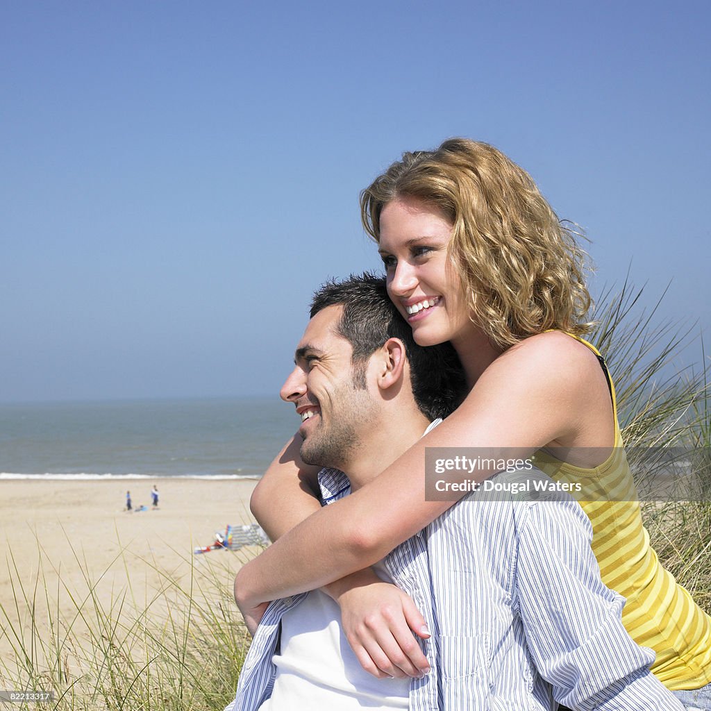 Young couple embracing each other at