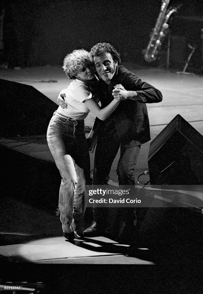 Springsteen Webmley 1981 American singer and songwriter Bruce Springsteen dances with a member ...