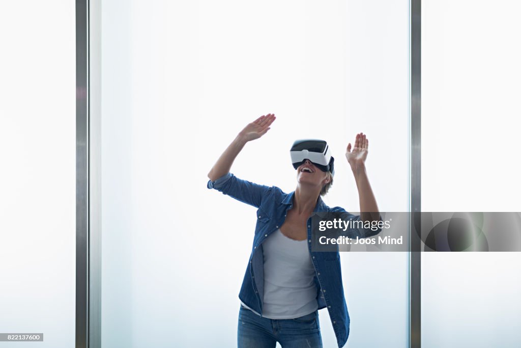 Young woman wearing VR Glasses