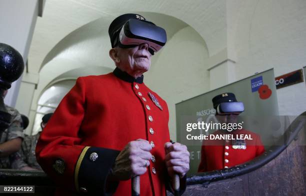 Chelsea pensioners John Kidman and Bill 'Spud' Hunt wear Virtual Reality headsets at a photocall during the Royal British Legion launch of the Battle...