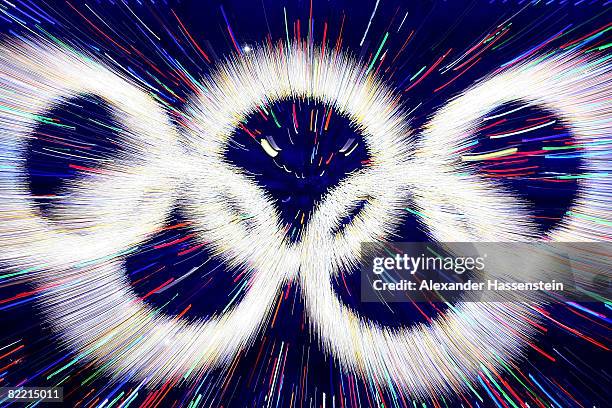 The Olympic rings are illuminated during the Opening Ceremony for the 2008 Beijing Summer Olympics at the National Stadium on August 8, 2008 in...