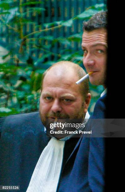 Former Societe Generale trader Jerome Kerviel , smokes a cigarette with his lawyer Eric Dupond-Moretti, at the financial police headquarters in...