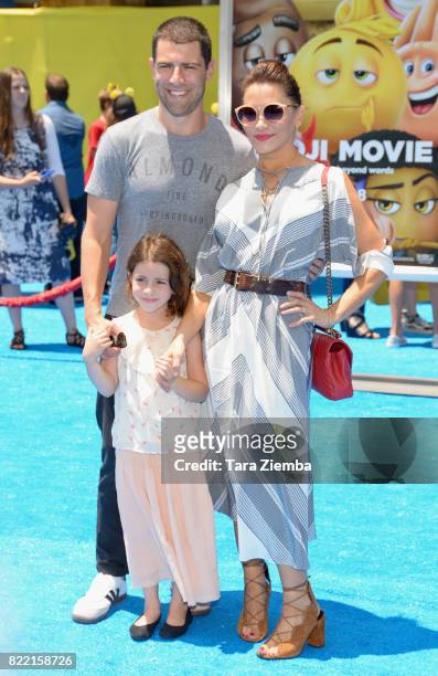 Tess Sanchez, actor Max Greenfield, and Lilly Greenfield attend the premiere of Columbia Pictures and Sony Pictures Animation's 'The Emoji Movie' at...