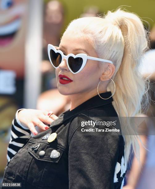 Singer Christina Aguilera attends the premiere of Columbia Pictures and Sony Pictures Animation's 'The Emoji Movie' at Regency Village Theatre on...