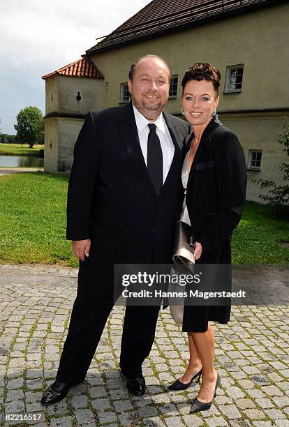 Wolfgang Lippert and Eva Binder attend the wedding of Designer Sarah Kern and Goran Munizaba at Blutenburg Castle on August 8, 2008 in Munich,...