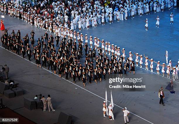 The New Zealand team enters the stadium during the Opening Ceremony for the 2008 Beijing Summer Olympics at the National Stadium on August 8, 2008 in...