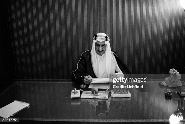 King Faisal of Saudi Arabia photographed in his office in Riyadh, Saudi Arabia on 25th April 1967. .