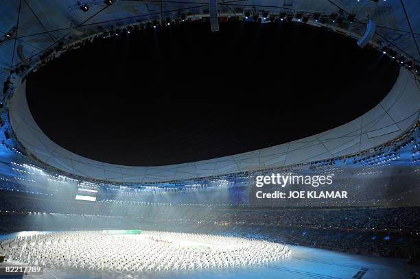 Entertainers perform Taijiquan, the most representative a shadow boxing in Chinese martial arts, during the opening ceremony of the 2008 Beijing...