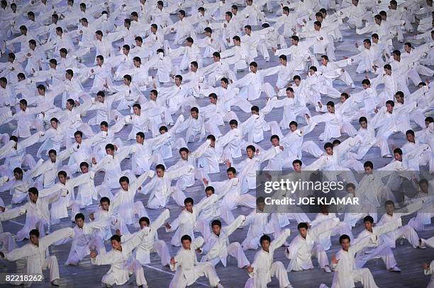 Entertainers perform Taijiquan, the most representative a shadow boxing in Chinese martial arts, during the opening ceremony of the 2008 Beijing...