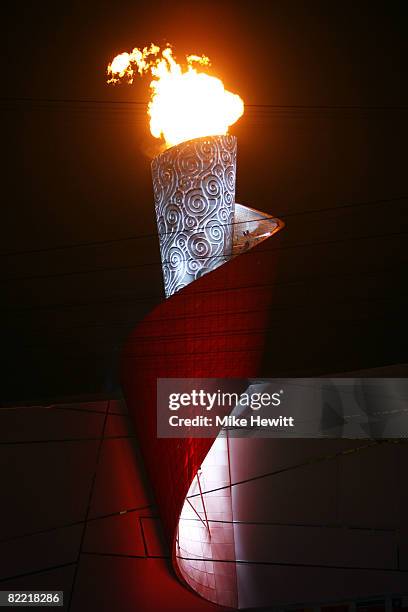 The Olympic flame is seen during the Opening Ceremony for the 2008 Beijing Summer Olympics at the National Stadium on August 8, 2008 in Beijing,...