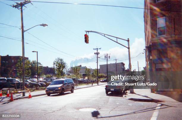 During the terrorist attacks of September 11 the Twin Towers of the World Trade Center in Manhattan are seen from a street corner in Jersey City, New...