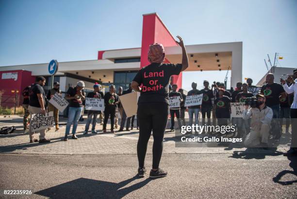 Black Land First members led by Andile Mngxitama and Zanele Lwaini protests outside MiWay Insurance headquarters following an allegedly fake email...