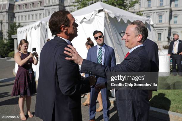 White House Chief of Staff Reince Priebus greets Joe Piscopo, comedian and host of "Piscopo In The Morning" during "Regional Media Day" at the White...