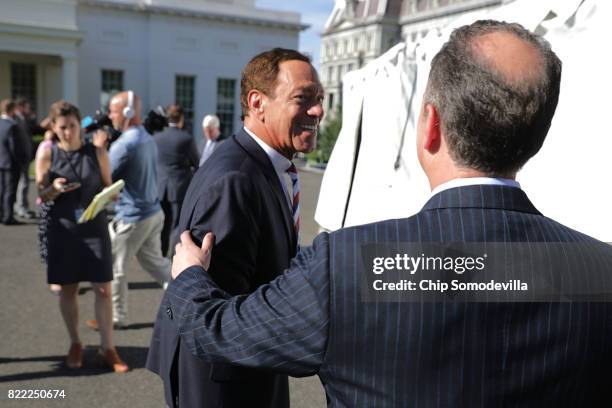 White House Chief of Staff Reince Priebus greets Joe Piscopo, comedian and host of "Piscopo In The Morning" during "Regional Media Day" at the White...