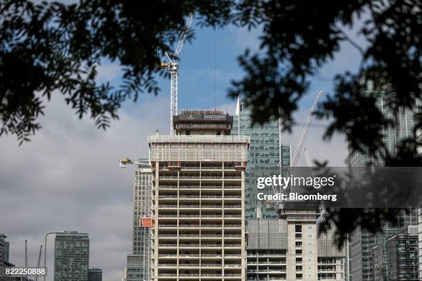 Construction work continues on residential flats at The Grid Building, being built by the Canary Wharf Group Plc, in the Canary Wharf financial,...