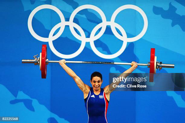 Melanie Noel of France competes in the Women's 48kg Group A Weightlifting event held at the Beijing University of Aeronautics and Astronautics...