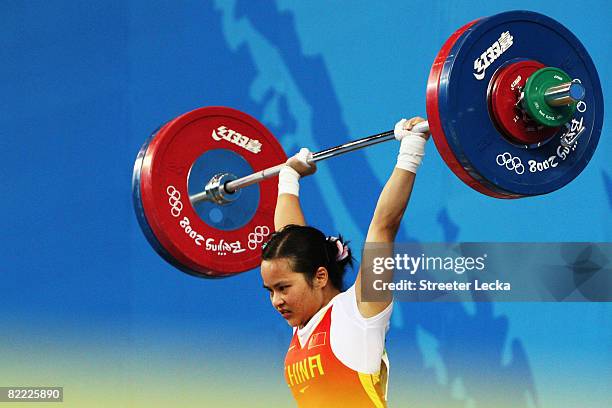 Chen Xiexia of China competes in the Women's 48kg Group A Weightlifting event held at the Beijing University of Aeronautics and Astronautics...