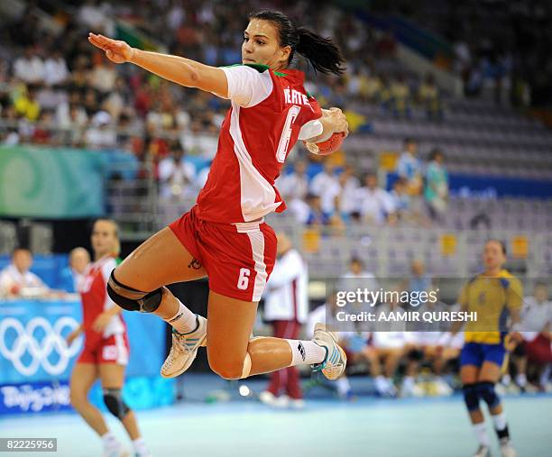 Verten Orsolya of Hungary jumps in the air as she scores a goal against Sweden during their 2008 Olympics Games handball match on August 9, 2008 in...