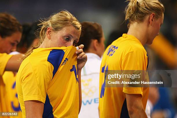 Johanna Ahlm of Sweden looks dejected after defaet in the handball match between Hungary and Sweden held at the Olympic Sports Center Gymnasium...