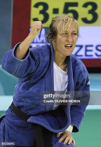 Hungary Eva Csernoviczki celebrates winnign against Brazil Sarah Menezes after their women -48kg preliminary match of the 2008 Beijing Olympic Games...