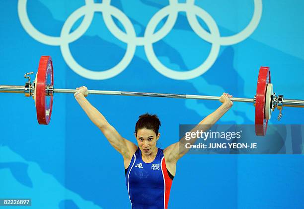 Melanie Noel of France competes in the women's 48kg weightlifting event during the 2008 Beijing Olympic Games at the Beijing University of...