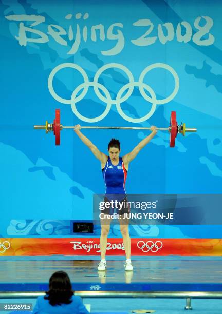 Melanie Noel of France competes in the women's 48kg weightlifting event during the 2008 Beijing Olympic Games at the Beijing University of...