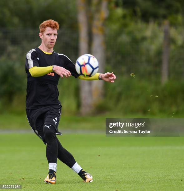 Jack Colback passes the ball during the Newcastle United Training session at the Newcastle United Training ground on July 25 in Newcastle upon Tyne,...