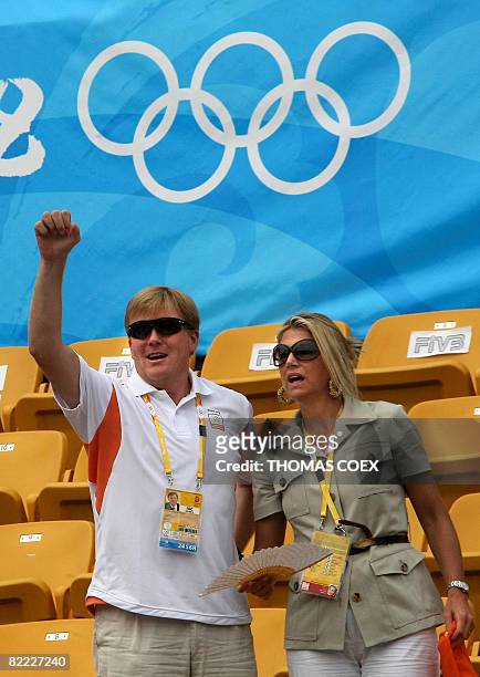 Prince Willem-Alexander of the Netherlands and his wife Princess Maxima attend the beach volleyball match Netherlands vs. Switzerland at Beijing's...