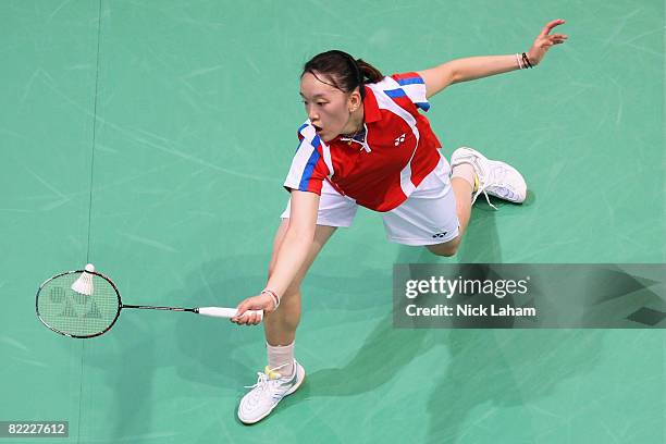 Eva Lee of USA plays a forehand in the Women's Singles round of 64 match against Anna Rice of Canada during the badminton event held at the Beijing...