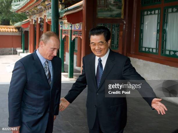 Russian Prime Minister Vladimir Putin meets with Chinese President Hu Jintao in the Zhongnanhai leaders compound August 9, 2008 in Beijing. Putin is...