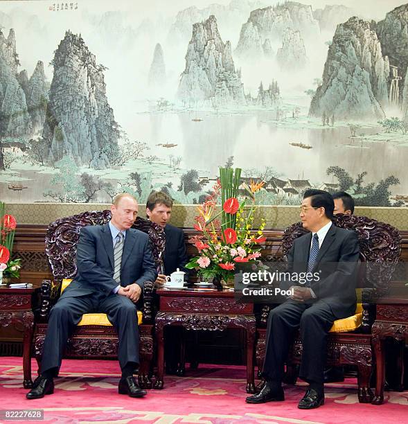 Russian Prime Minister Vladimir Putin meets with Chinese President Hu Jintao in the Zhongnanhai leaders compound August 9, 2008 in Beijing. Putin is...