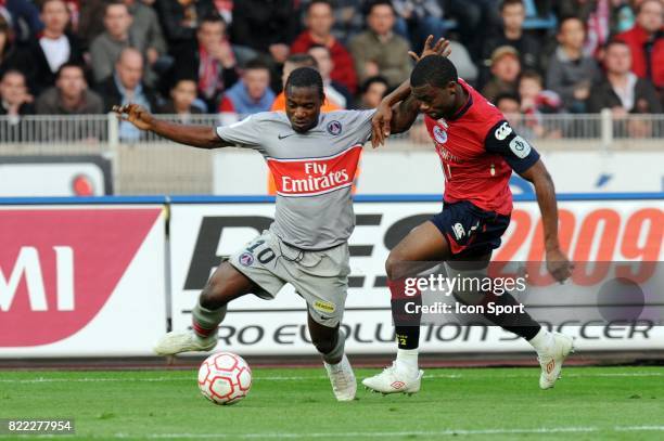 Stephane SESSEGNON / Aurelien CHEDJOU - - Lille / PSG - 31 eme journee de Ligue 1 - Stadium Nord - Lille Villeneuve d'Ascq,