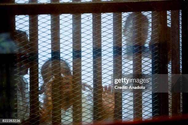Defendants are seen during the summary judgement session of Cabinet Incidents trial, chaired by Judge Nagy Shehata, at Cairo Criminal court in Cario,...