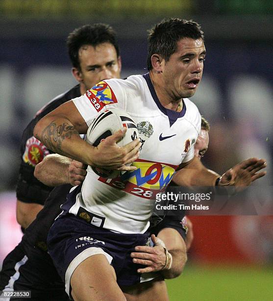 Corey Parker of the Brisbane Broncos is tackled during the round 22 NRL match between the New Zealand Warriors and the Brisbane Broncos held at Mt...