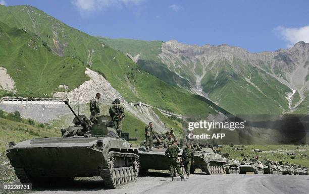 Convoy of Russian troops makes its way through the mountains toward the armed conflict between Georgian troops and separatist South Ossetian troops,...