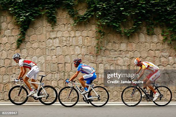 Andy Schleck of Luxembourg, Alexander Kolobnev of Russia and Samuel Sanchez of Spain compete in the Men's Road Cycling event held on the Road Cycling...