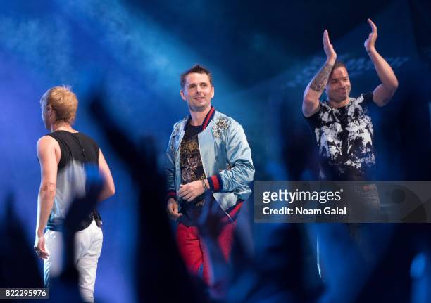 Dominic Howard, Matt Bellamy and Chris Wolstenholme of Muse perform in concert at Central Park SummerStage on July 24, 2017 in New York City.