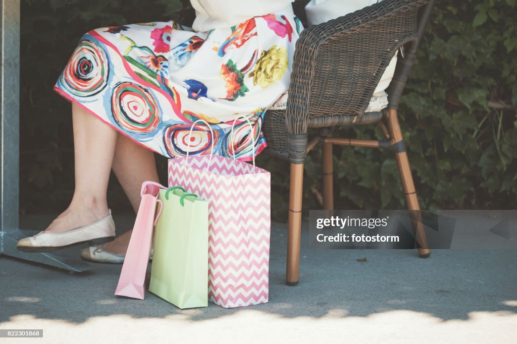 Woman resting after shopping