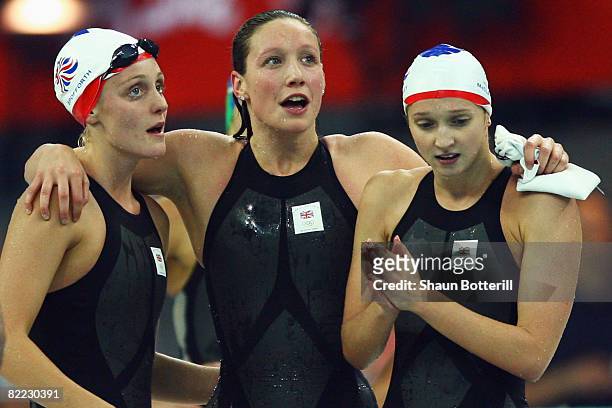 Francesca Halsall, Julia Beckett and Caitlin Mcclatchey of the Great Britain Women's 4x100m Freestyle Relay team cheers on Melanie Marshall of Great...