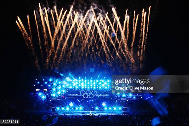 Fireworks explode during the opening launch ceremony held at the Qingdao Olympic Sailing Center during day 1 of the Beijing 2008 Olympic Games on...