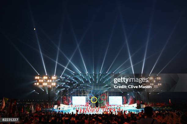 Dancers perform during the opening launch ceremony held at the Qingdao Olympic Sailing Center during day 1 of the Beijing 2008 Olympic Games on...