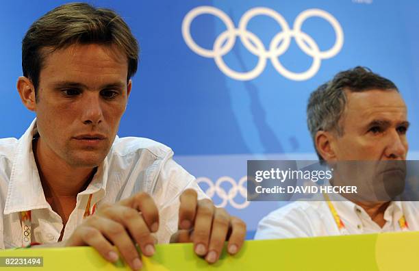 Horse trials European champion, French Nicolas Touzaint and President of the French Equestrian Federation Serge Lecomte listen to questions during a...