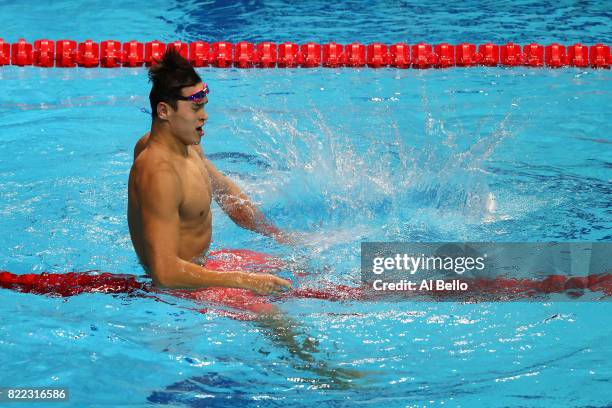 Yang Sun of China celebrates after winning the gold medal during the Men's 200m Freestyle final on day twelve of the Budapest 2017 FINA World...